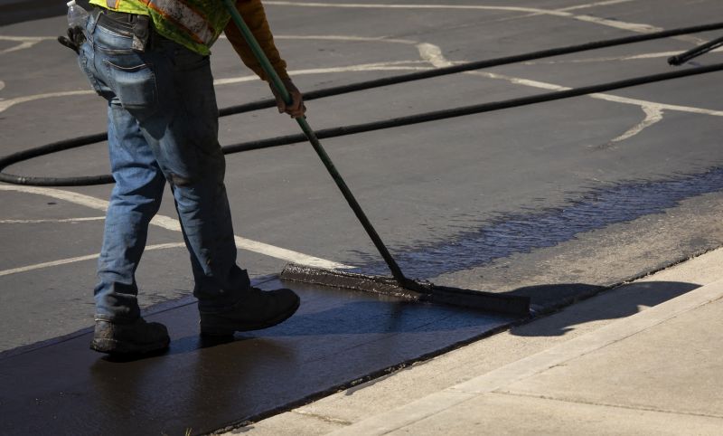 Technician Applying Sealant