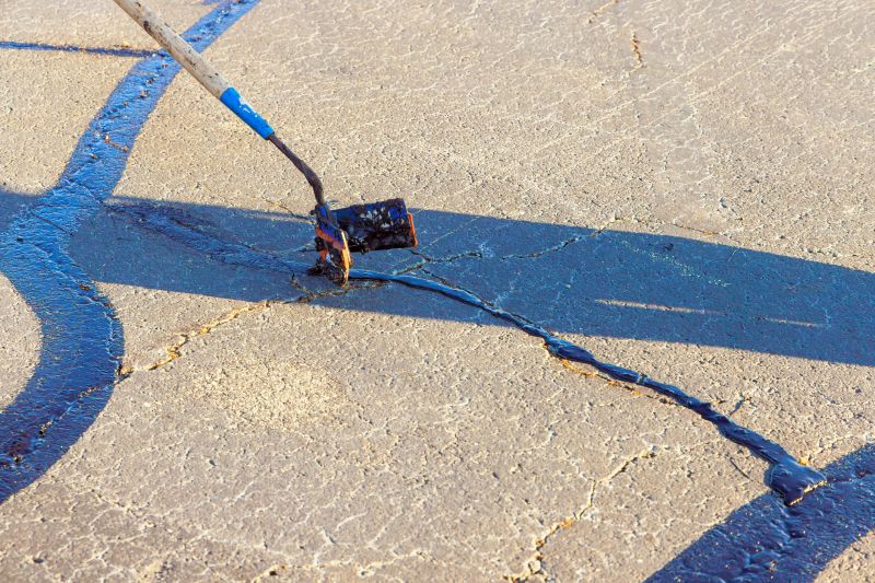 Curing Asphalt Sealant